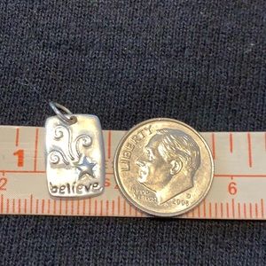 Sterling silver “believe” pendant